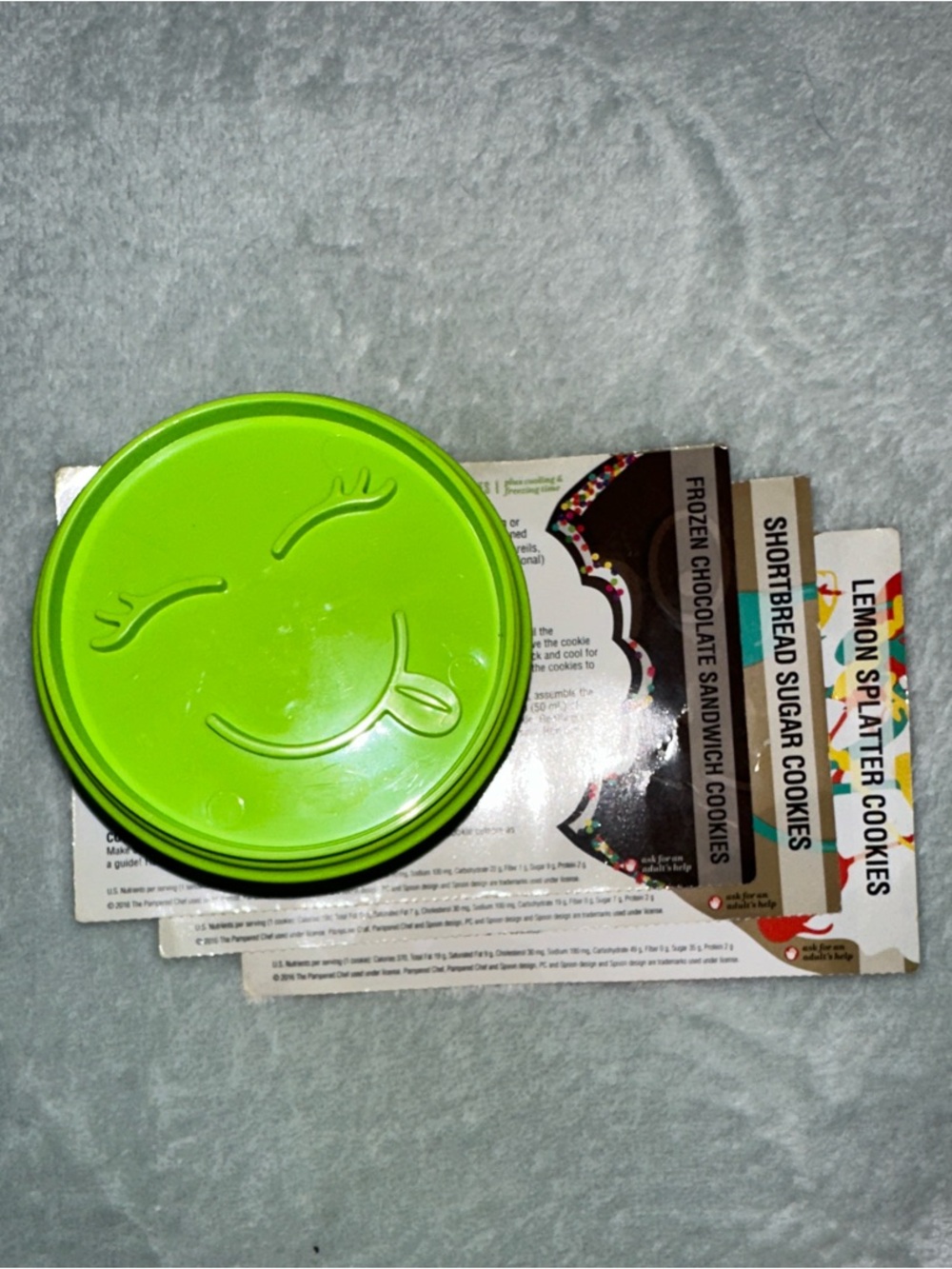 NWOT Tupperware Set of 7 Green Emoji Cookie Cutters with Recipes - Picture 3 of 4